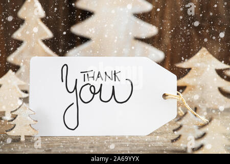 Arbre de Noël, l'étiquette avec la calligraphie anglaise Merci, Snowflakes Banque D'Images