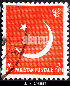Étoiles et le croissant sur timbre-poste du Pakistan Banque D'Images