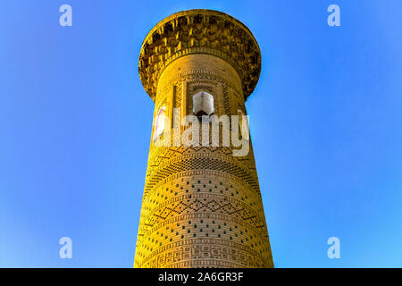 Sayid Niaz Sheliker Minaret, près de la porte est de Khiva, en Ouzbékistan. Banque D'Images