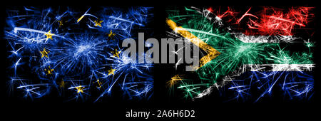 Ue, l'Afrique du Sud contre l'Union européenne, nouvel an fête africaine drapeaux fireworks mousseux fond concept. Combinaison de deux membres des drapeaux. Banque D'Images