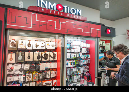 Georgia,Atlanta,Hartsfield-Jackson aéroport international d'Atlanta,terminal,intérieur,InMotion,entrée principale,accessoires de divertissement,kiosque,argent des employés Banque D'Images
