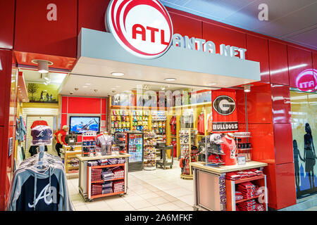 Georgia,Atlanta,Hartsfield-Jackson aéroport international d'Atlanta,terminal,intérieur,Atlanta Net,entrée principale,équipes sportives souvenirs,produits sous licence,s Banque D'Images
