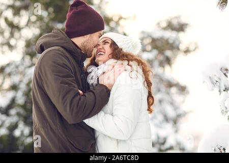 Woman meditating in snowy forest Banque D'Images