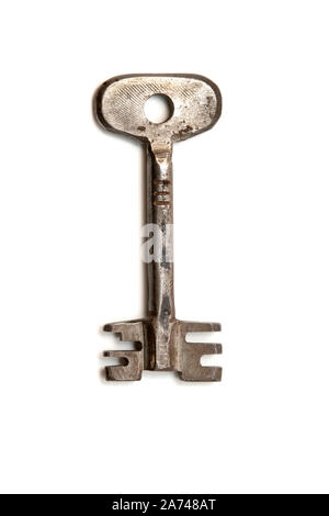 Ancienne clé sur un fond blanc Banque D'Images