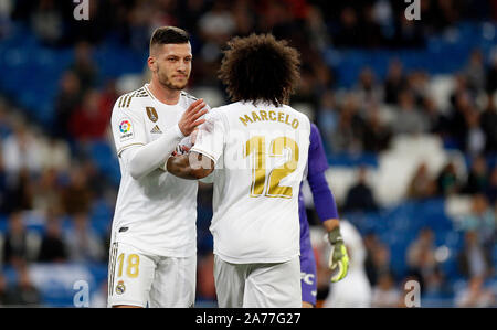 Madrid, Espagne. 31 octobre, 2019. Real Madrid CF's Marcelo Vieira et le Real Madrid CF's Luka Jovic vu au cours de l'espagnol La Liga match ronde 11 entre le Real Madrid et CD Leganes à Santiago Bernabeu Stadium.(score final : 5 - 0 Real Madrid Leganes) Credit : SOPA/Alamy Images Limited Live News Banque D'Images