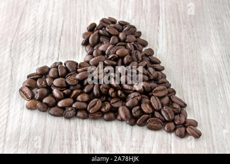 Les grains de café en forme de coeur Banque D'Images