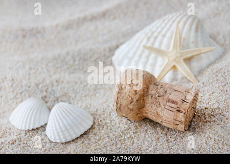 Bouchon de Champagne et de la plage Banque D'Images