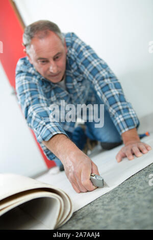 Raccord mâle de tapis de plancher sur l'artisan Banque D'Images