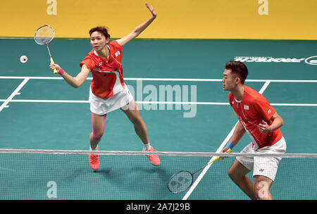 Macao, Chine. 29Th sep 2019. Wang Chi-Lin/Cheng Chi Ya (L), du Taipei chinois au cours de la compétition finale du contre l'Dechapol Puavaranukroh Sapsiree Taerattanachai/de la Thaïlande à Macao Ouvrir tournoi de badminton à Macao, Chine du sud, le 3 novembre 2019. Credit : Lo Fai Ping/Xinhua/Alamy Live News Banque D'Images