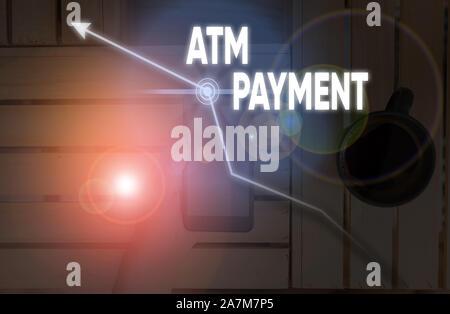 Écrit remarque montrant un distributeur automatique de paiement. Concept d'affaires pour le trafic des paiements effectués par l'intermédiaire d'appareils électroniques portables Banque D'Images