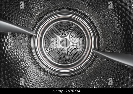 Lave-linge linge vue intérieure d'un tambour. Banque D'Images