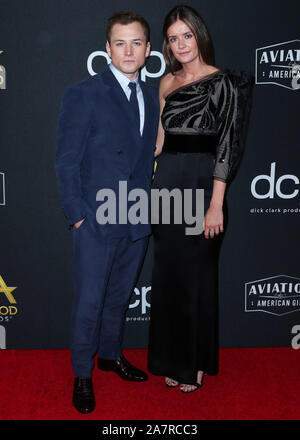 Los Angeles, États-Unis. 06Th Nov, 2019.Acteur Taron Egerton et petite amie Emily Thomas arriver au 23e Prix du cinéma hollywoodien qui s'est tenue à l'hôtel Beverly Hilton le 3 novembre 2019 à Beverly Hills, Los Angeles, Californie, États-Unis. (Photo par Xavier Collin/Image Press Office) Banque D'Images