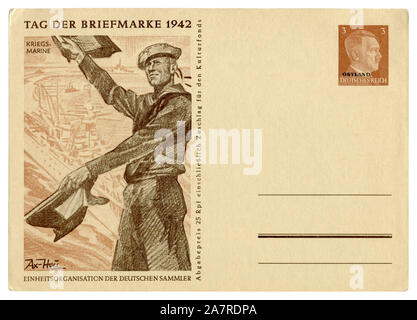 Carte postale historique allemand : timbre poste jour 1942, marin de la Kriegsmarine avec pavillons de signalisation, Adolf Hitler, l'Allemagne, l'ostland, surimpression Troisième Reich Banque D'Images