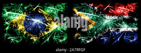 Le Brésil, l'Afrique du Sud brésilien, africain Nouvel An fête drapeaux fireworks mousseux fond concept. Combinaison de deux membres des drapeaux. Banque D'Images