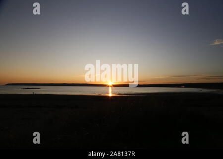 Soleil au-dessus de la mer Banque D'Images