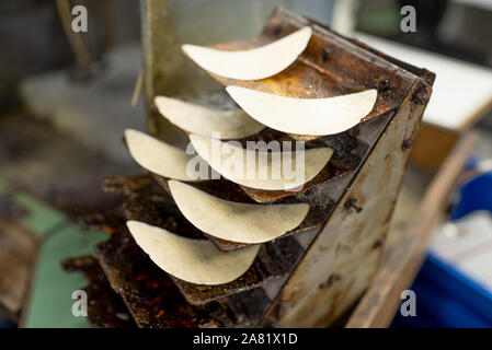 Plaques sous-appareil de chauffage. La fabrication de chaussures. Banque D'Images