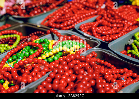 Perles rouges en bois. Close-up. Vivement. Banque D'Images