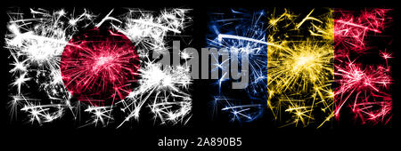 Le Japon, le japonais contre le Tchad, célébration du Nouvel An tchadien drapeaux fireworks mousseux fond concept. Combinaison de deux états abstraits des drapeaux. Banque D'Images
