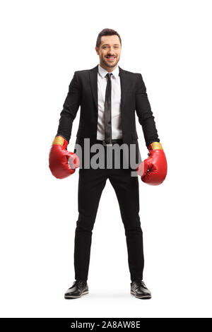 Portrait of a businessman wearing boxing gloves and smiling at the camera isolé sur fond blanc Banque D'Images