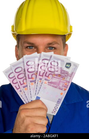 Ein Arbeiter in einem ( Gewerbebetrieb Handwerker ) mit Euro 2500 in der Hand, 5 x 500 euros, M. : oui ; 25, 30 Jahre Banque D'Images