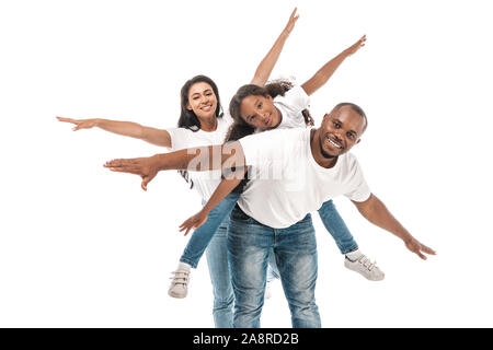 Cheerful african american family imitant le vol avec la main tendue sur fond blanc Banque D'Images