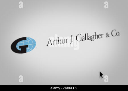 Logo de l'entreprise publique Arthur J. Gallagher & Co. s'affiche sur l'écran d'un ordinateur en gros plan. Credit : PIXDUCE Banque D'Images