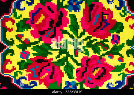 Fragment d'une folklorique roumaine. La broderie traditionnelle roumaine. Texture ethnique design. Design tapis traditionnels. Un design rustique Banque D'Images