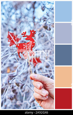 Décoration de Noël à la main en bois de cerf et collection de saison Noël couleurs. Collage pour combinaison collection palette de couleurs chaudes et froides Banque D'Images