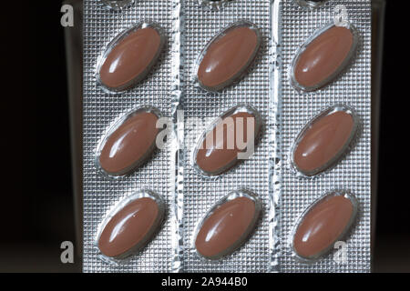 Photo macro de pilules dans son emballage Banque D'Images
