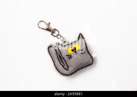 Trousseau estimé en forme chaton. Bijoux faits main. Banque D'Images