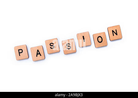 Le mot passion, de l'épeautre avec des lettres sur un fond blanc. Banque D'Images