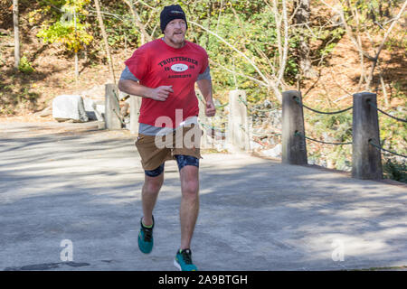 Runner concurrentes dans 'Roi de la James' triathlon. Banque D'Images