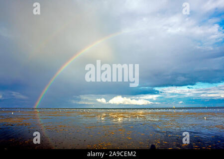 Regenbogen am Strand von Schillig Banque D'Images