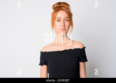 Visage de jeune belle redhead woman looking at camera Banque D'Images