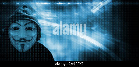 Pirate informatique anonyme avec masque et cagoule Banque D'Images