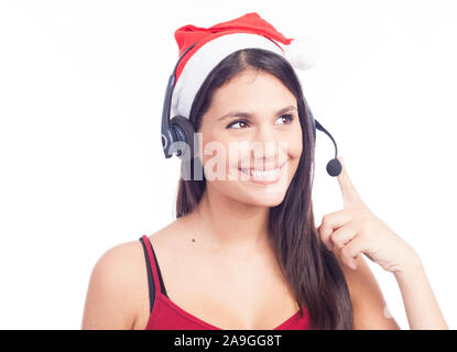 Casque femme de Noël centre d'appels de télémarketing porter du rouge santa hat smiling parlant isolé sur fond blanc. Banque D'Images