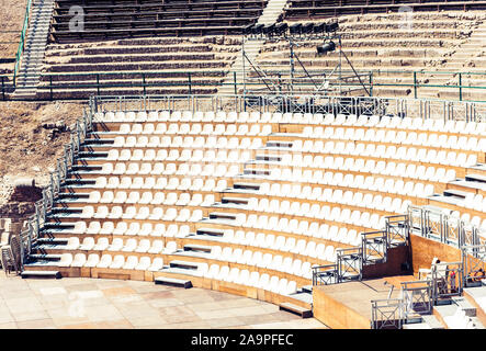 Sièges de l'amphithéâtre antique Teatro Greco in Taormina, Sicile, Italie Banque D'Images