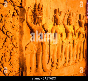 Sculptures murales au coucher du soleil, temple Bayon, Angkor Watt Parc Archéologique, Cambodge, Ville d'Angkor Thom, construit 1100-1200, la culture khmers rin Banque D'Images