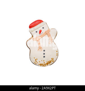 D'épices de Noël sous la forme d'un bonhomme blanc recouvert de glaçage sucré. Maison de vacances Maison de pâtisseries. Isolé sur un fond blanc. Banque D'Images