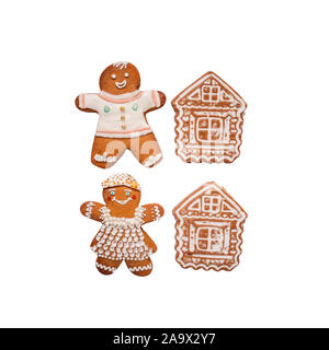 Gingerbread cookies de Noël sous la forme d'hommes et les maisons sont couvertes de givre doux blanc. Maison de vacances Maison de pâtisseries. Isolated on a white background Banque D'Images