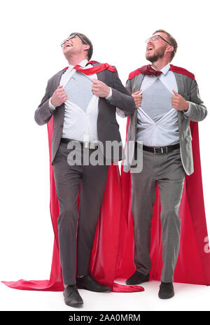 Deux collègues de capes rouges debout dans Superman poser Banque D'Images