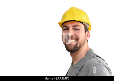 Cheerful worker - artisan dans les vêtements de travail isolé sur fond blanc - Banque D'Images