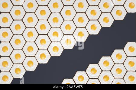Modèle hexagonal fait d'œufs frits, avec l'espace pour les titres Banque D'Images