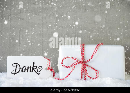 Un cadeau de Noël, la neige, les flocons de neige, Ciment, Danke, Merci Banque D'Images