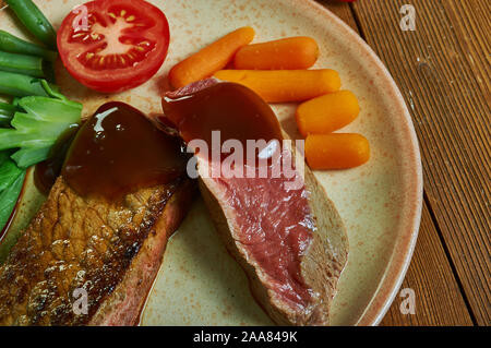 Filet de boeuf Prince Albert, la préparation d'un filet de boeuf qui a été nommé en l'honneur du mari de la reine Victoria. Banque D'Images