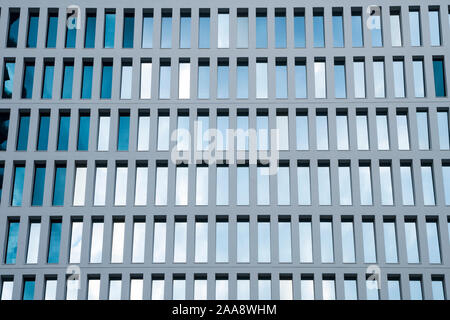Office building windows background. Résumé motif géométrique formé par des éléments architecturaux. Structure modulaire en béton. Un bâtiment contemporain.