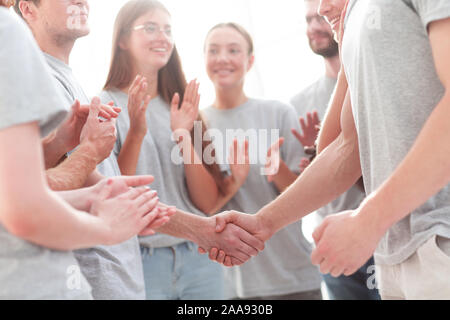 Poignée de membres du groupe de contact, d'applaudissements Banque D'Images