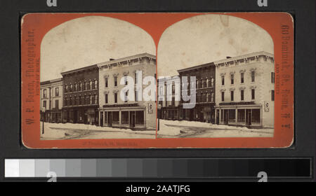 Dominick Street, côté sud (vue d'un immeuble commercial) un paysage urbain vue présentant les bâtiments à flanc de colline et de rails de chemin de fer en premier plan a une vue d'un store intérieur le verso. Robert Dennis Collection de vues stéréoscopiques. Titre conçu par cataloger. Une vue sur le Centre de New York y compris Cayuga, Madison, Onondaga, Oneida, Oswego, Sénèque l'Ontario et les comtés de Yates et les villes d'Auburn, Canandaigua, Genève, Manlins, New Haven, Oswego, Ovide, Penn Yan, Seneca Falls, Skaneateles, Waterville, Waterloo et y compris les vallons, lacs, cascades, et les ponts de chemin de fer, y compris les ponts sur le S. Banque D'Images