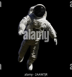 Au cours de l'astronaute dans l'espace, isolé sur fond noir Banque D'Images