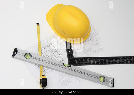 Les casques et les outils pour les plans de construction et des bâtiments Banque D'Images